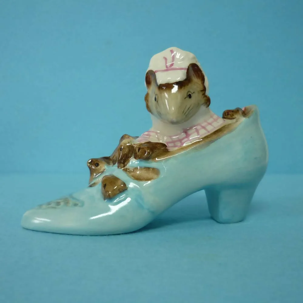 A Beswick Beatrix Potter Figurine The Old Woman who lived in a Shoe. BP3b.