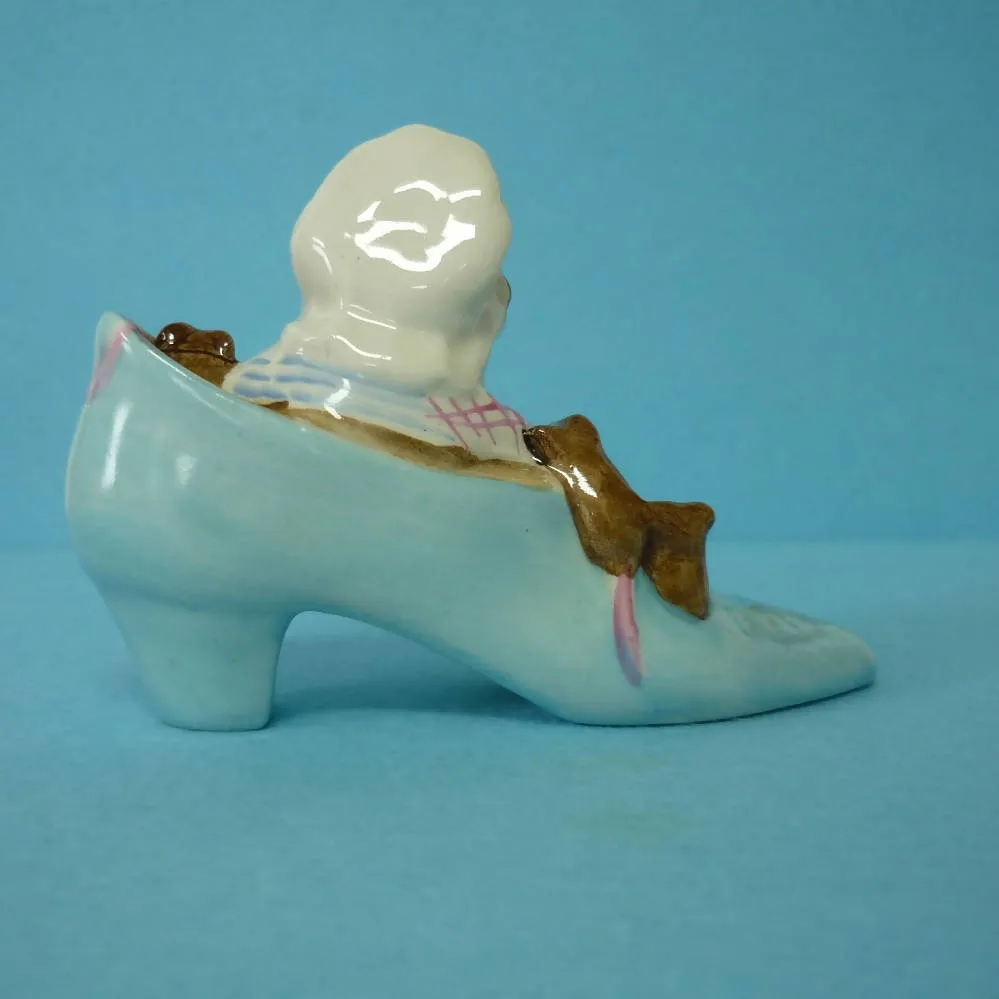 A Beswick Beatrix Potter Figurine The Old Woman who lived in a Shoe. BP3b.