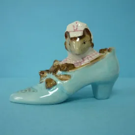 A Beswick Beatrix Potter Figurine The Old Woman who lived in a Shoe. BP3b.