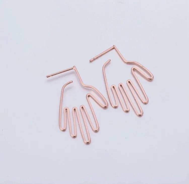 A. Hand shaped earrings/silhouette style/hand therapy jewelry